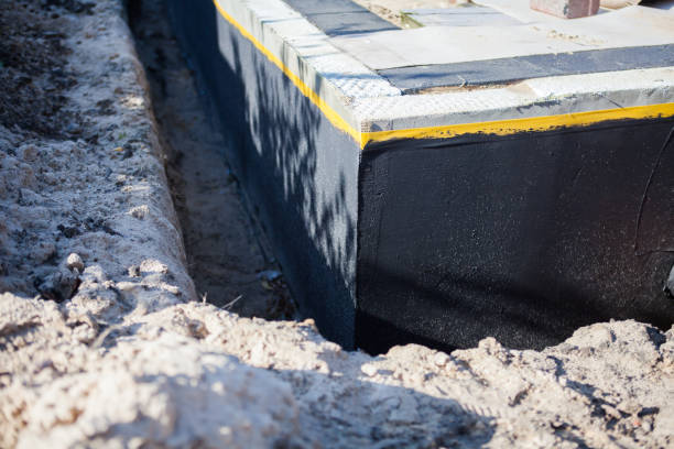 Professional Waterproofing technician working in Ashburn, GA